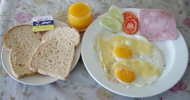 Fried eggs bread salad and with real Dutch 
